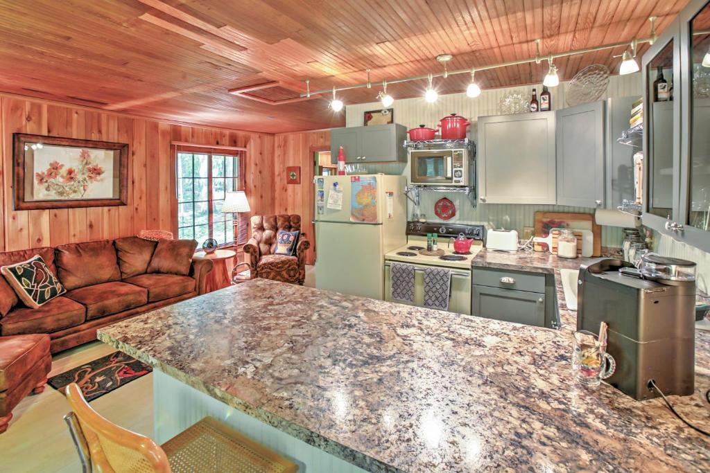 a kitchen with a large counter top in a room at Pet-Friendly One Crow Cottage in Harbor Springs! in Harbor Springs