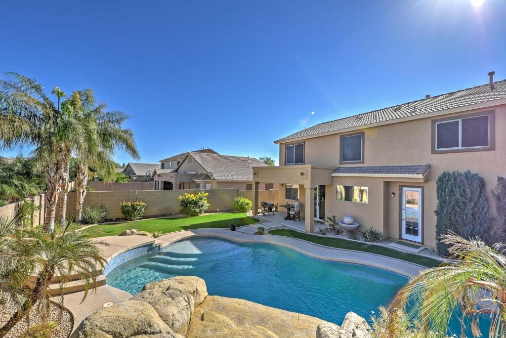 The swimming pool at or close to Inviting Surprise Home with Private Pool, Near Golf!
