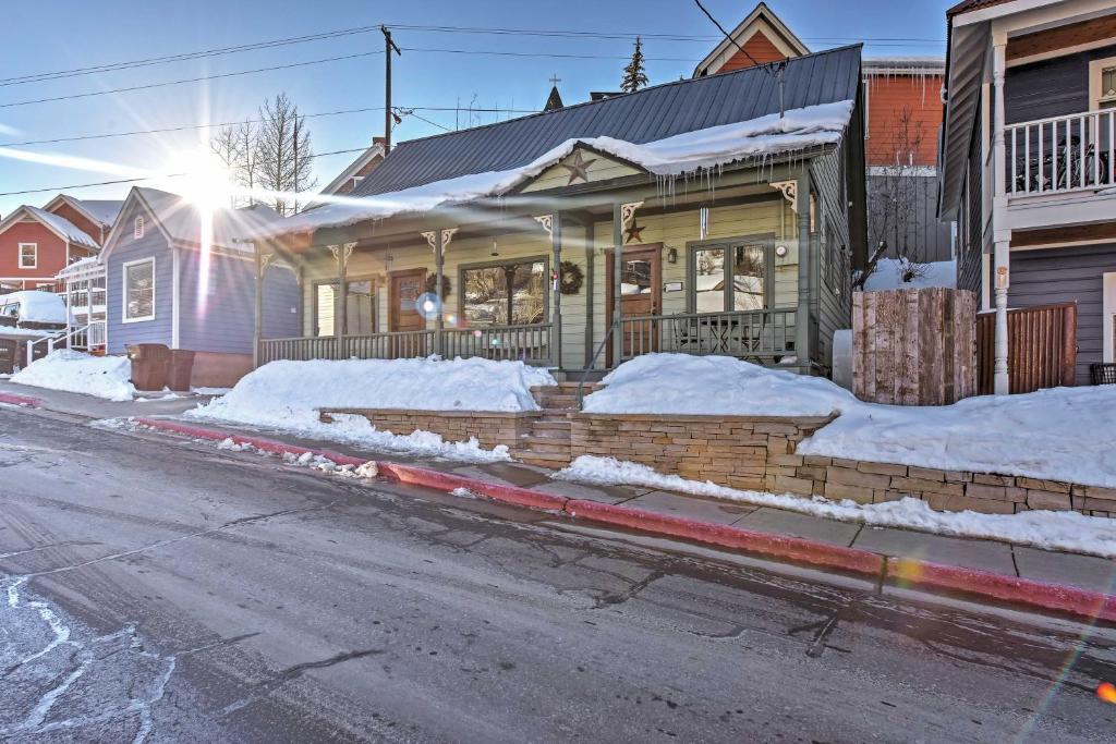 a house on the side of a snow covered street at Downtown Park City Vacation Rental Near Ski Lift! in Park City