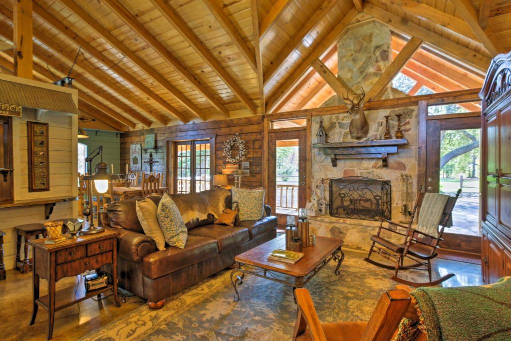 a living room with a couch and a fireplace at Beaver Creek Lodge - Huntington Home with Pond! in Huntington