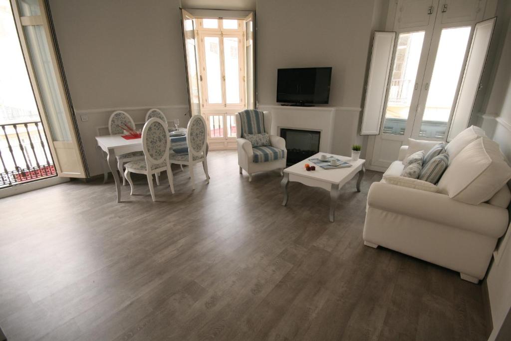 Posedenie v ubytovaní Apartamentos Calle Larios
