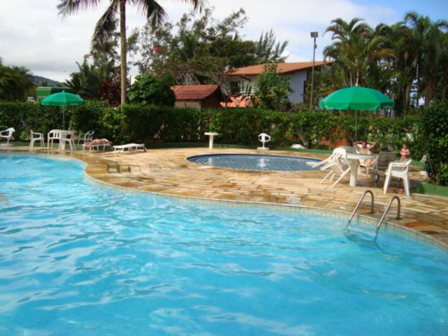  Condomínio a 1 metro da Praia Toninhas Ubatuba Pé na Areia Apartamento