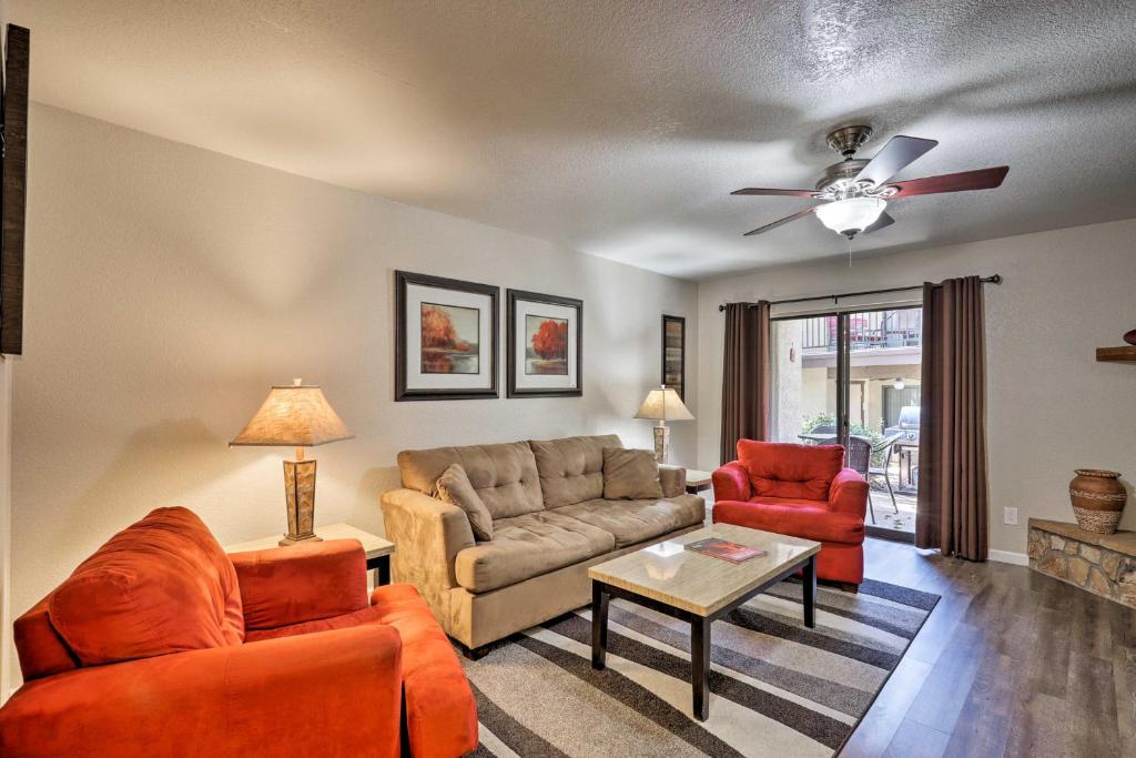 a living room with a couch and two chairs at Canyon Mesa Golf Condo with Majestic Mountain Views! in Sedona