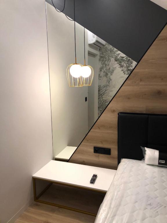 Posteľ alebo postele v izbe v ubytovaní Apartamenty Premium New