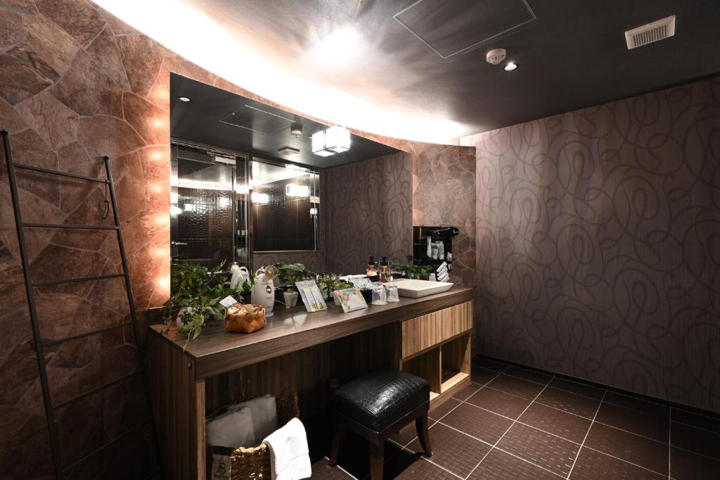 Příslušenství pro přípravu čaje a kávy v ubytování HOTEL The Scene