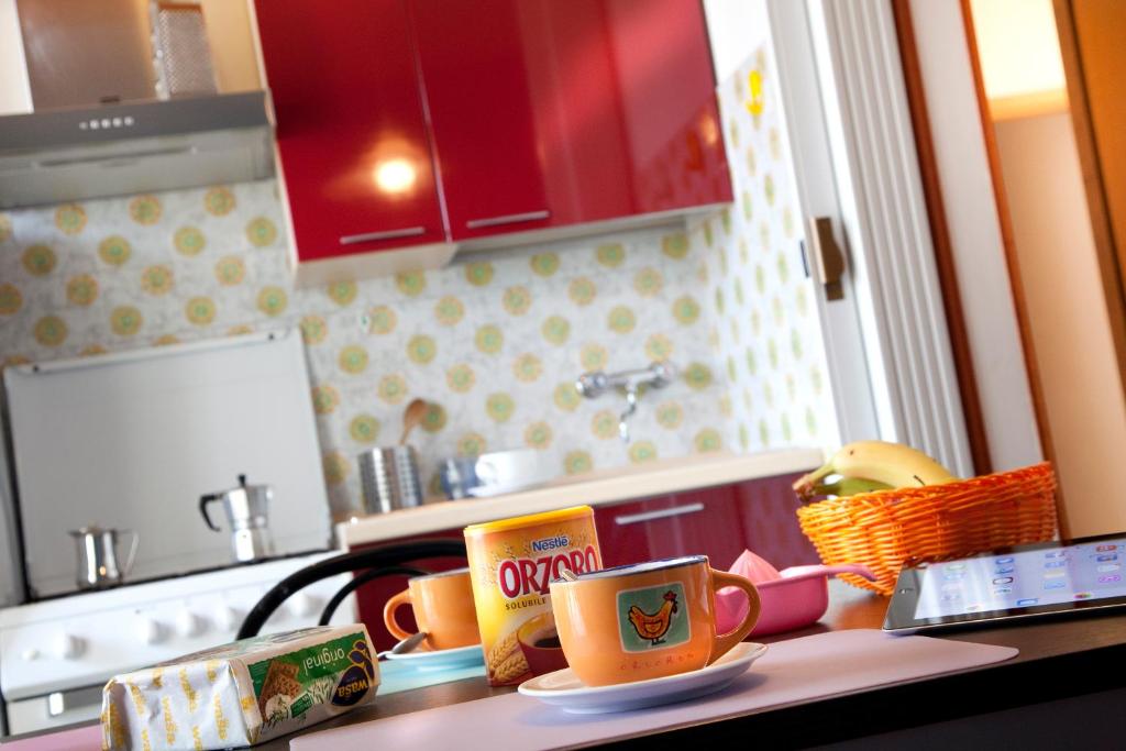 A kitchen or kitchenette at Residence Holiday