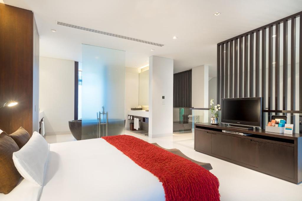 TV a/nebo společenská místnost v ubytování Twinpalms Surin Beach Phuket