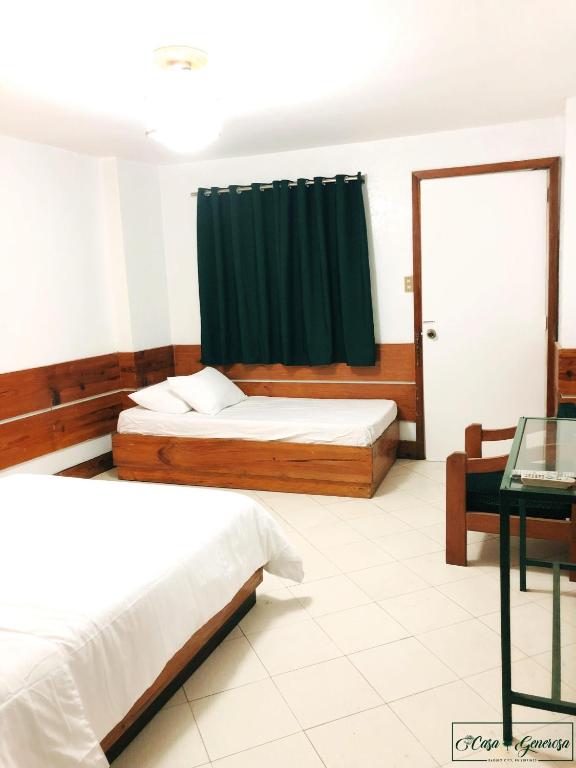 Postel nebo postele na pokoji v ubytování Casa Generosa