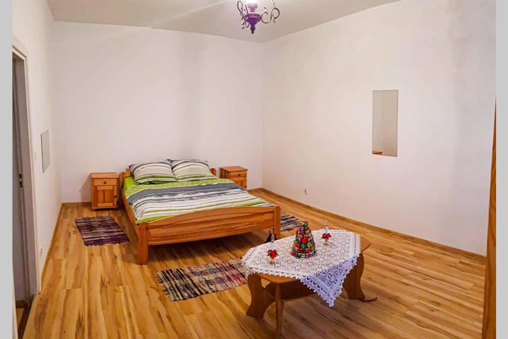 Lova arba lovos apgyvendinimo įstaigoje Apartament w CENTRUM Zakopanego