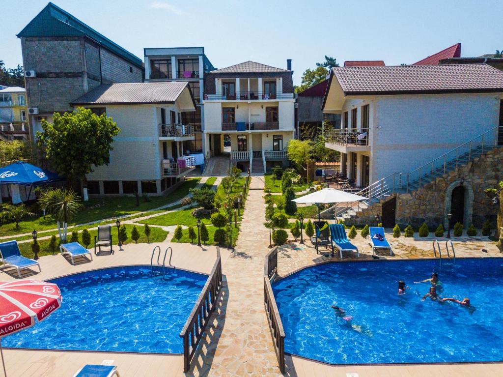 een afbeelding van een zwembad in een resort bij Hotel Chero in Kobuleti