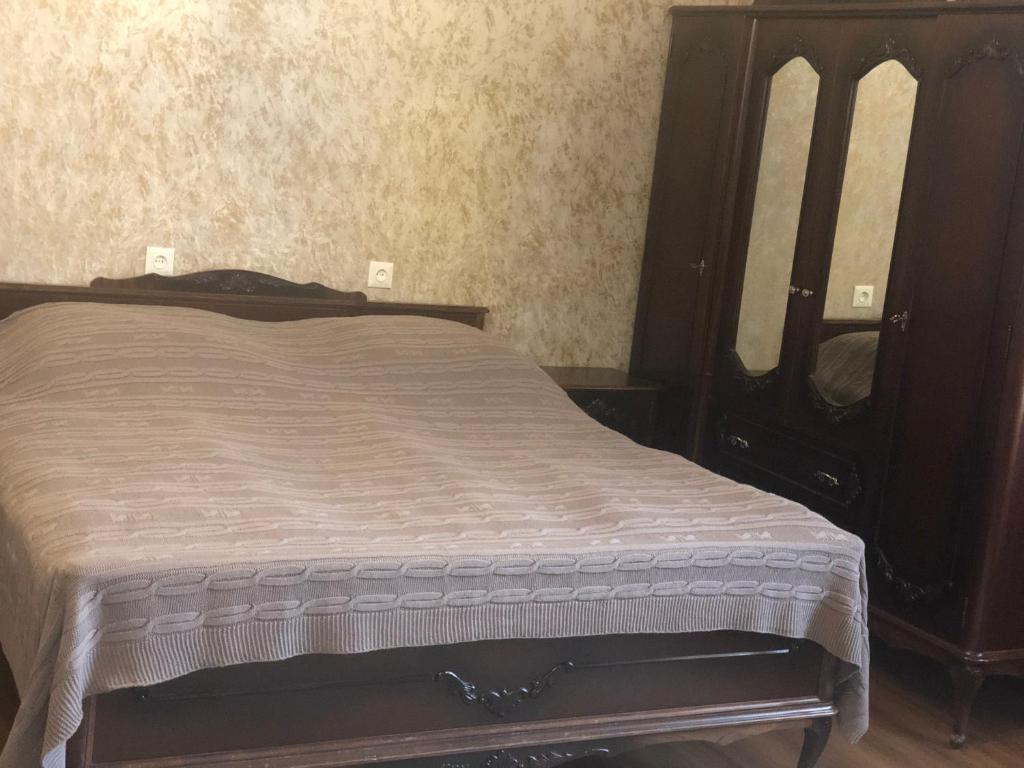 Postel nebo postele na pokoji v ubytování Lia Khaikashvili Guest House