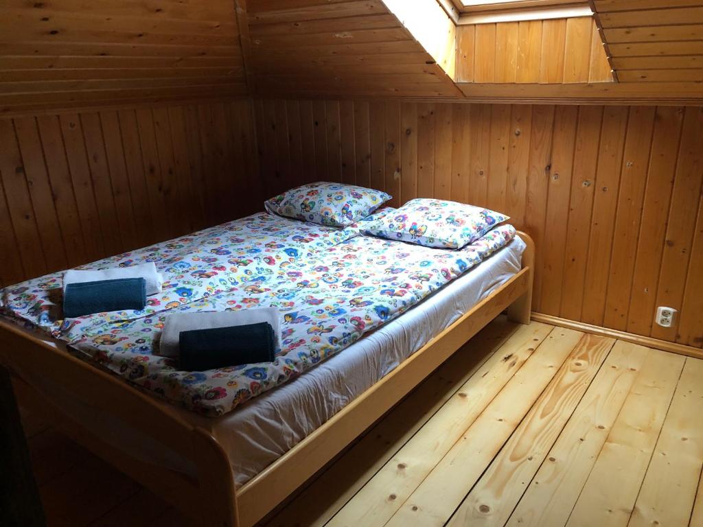 Postel nebo postele na pokoji v ubytování Domek Malinka 13