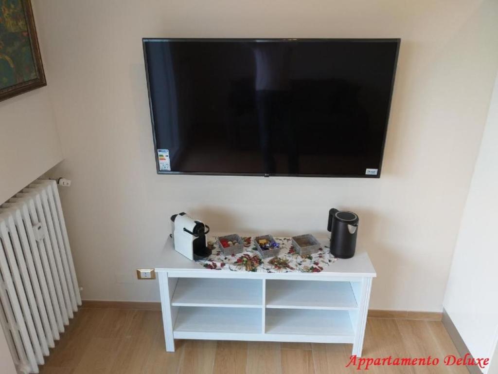 TV a/nebo společenská místnost v ubytování Le Rive