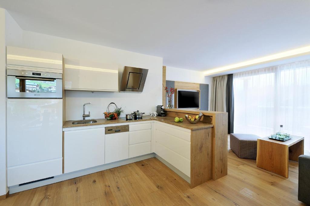 Kuchyň nebo kuchyňský kout v ubytování Sunnsait - Appartements für Genießer