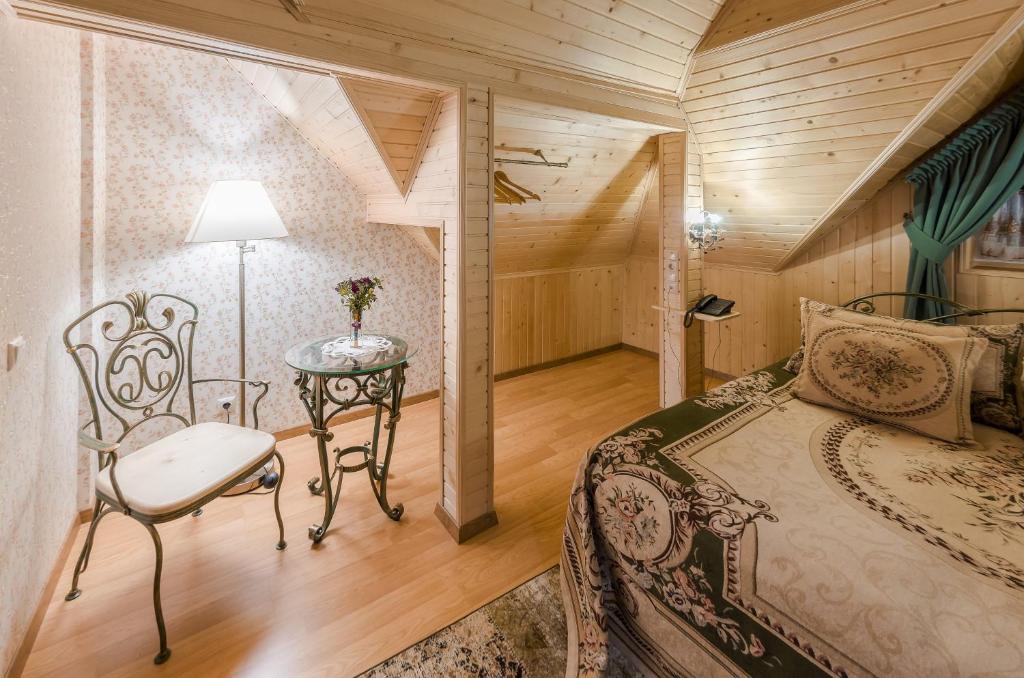 Postel nebo postele na pokoji v ubytování Bystrytsya Lux