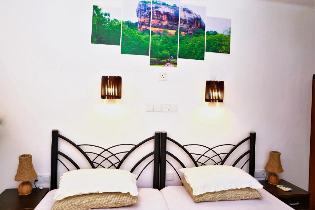Letto o letti in una camera di Camellia Dwelling