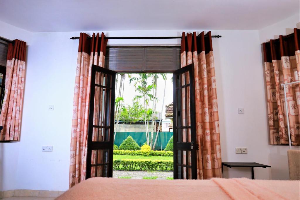 Letto o letti in una camera di Camellia Dwelling