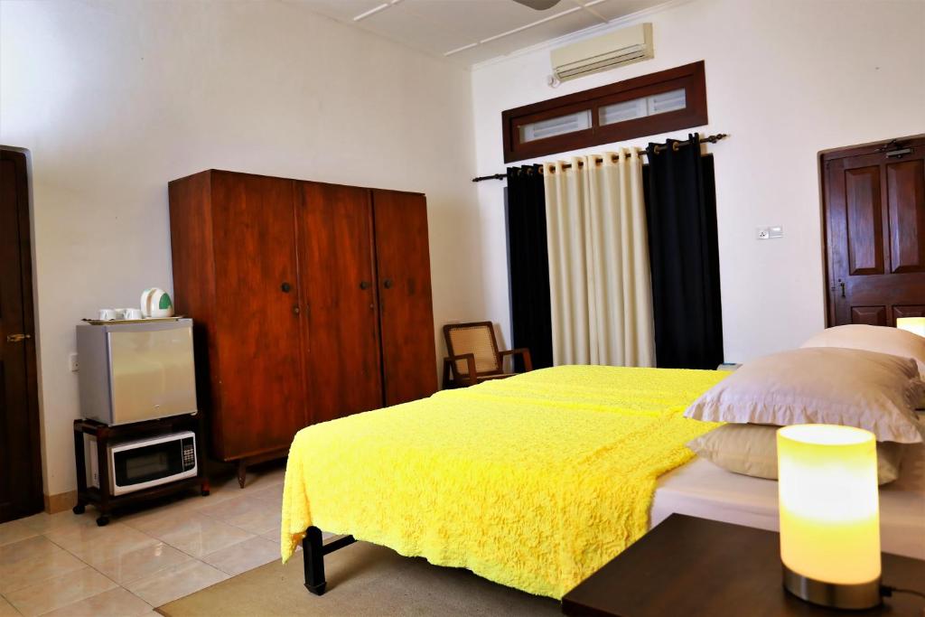 Letto o letti in una camera di Camellia Dwelling