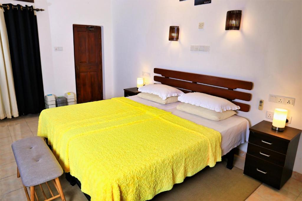 Letto o letti in una camera di Camellia Dwelling