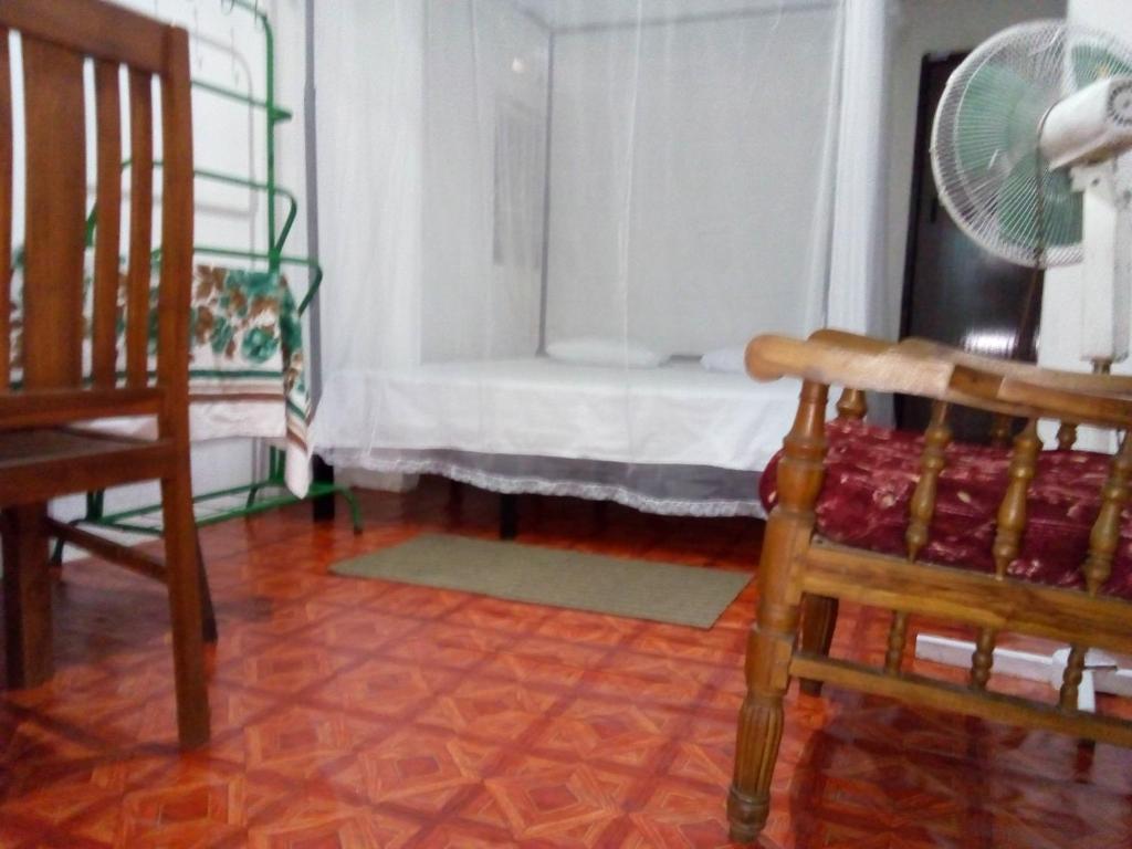 Postel nebo postele na pokoji v ubytování T & U Homestay