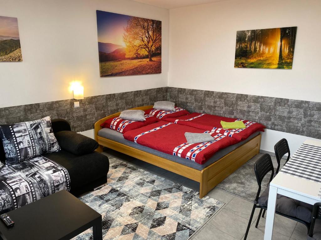 Łóżko lub łóżka w pokoju w obiekcie Apartman Nikola Trojanovice