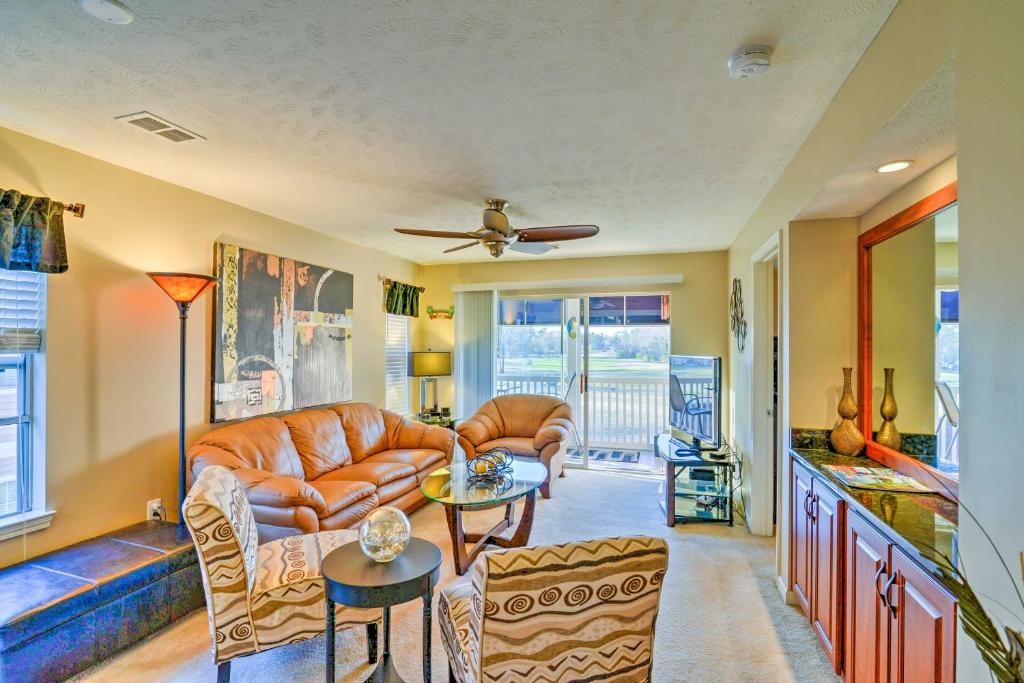 a living room with a couch and a table at Myrtle Beach Oasis on River Oaks Golf Course! in Myrtle Beach