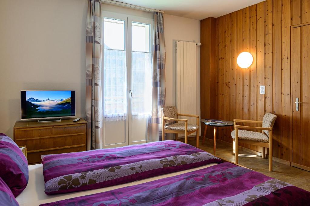 Postel nebo postele na pokoji v ubytování Hotel Bel-Air Eden