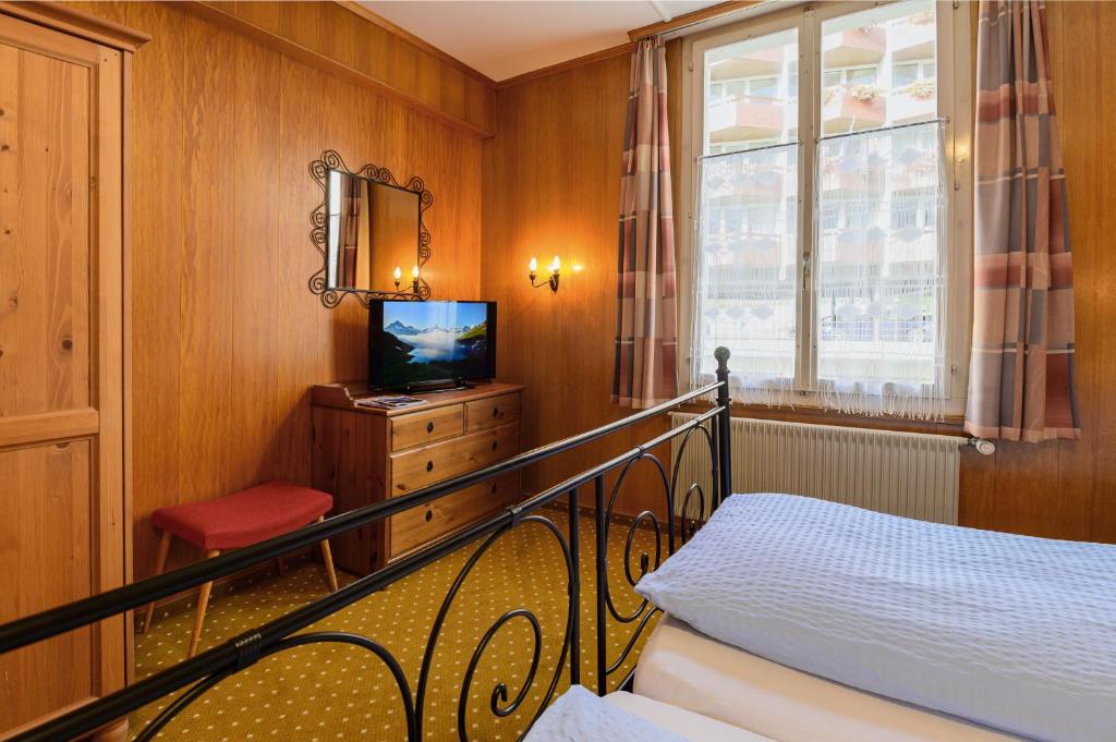 Postel nebo postele na pokoji v ubytování Hotel Bel-Air Eden