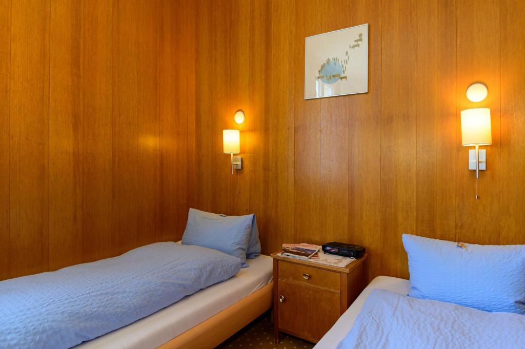 Postel nebo postele na pokoji v ubytování Hotel Bel-Air Eden
