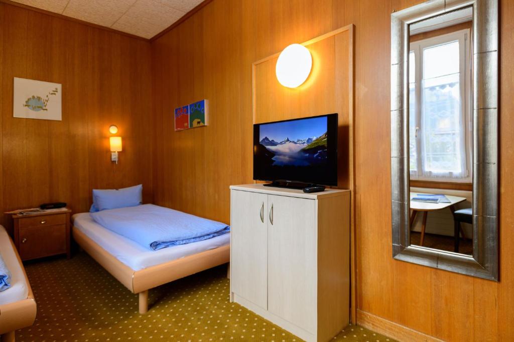Postel nebo postele na pokoji v ubytování Hotel Bel-Air Eden