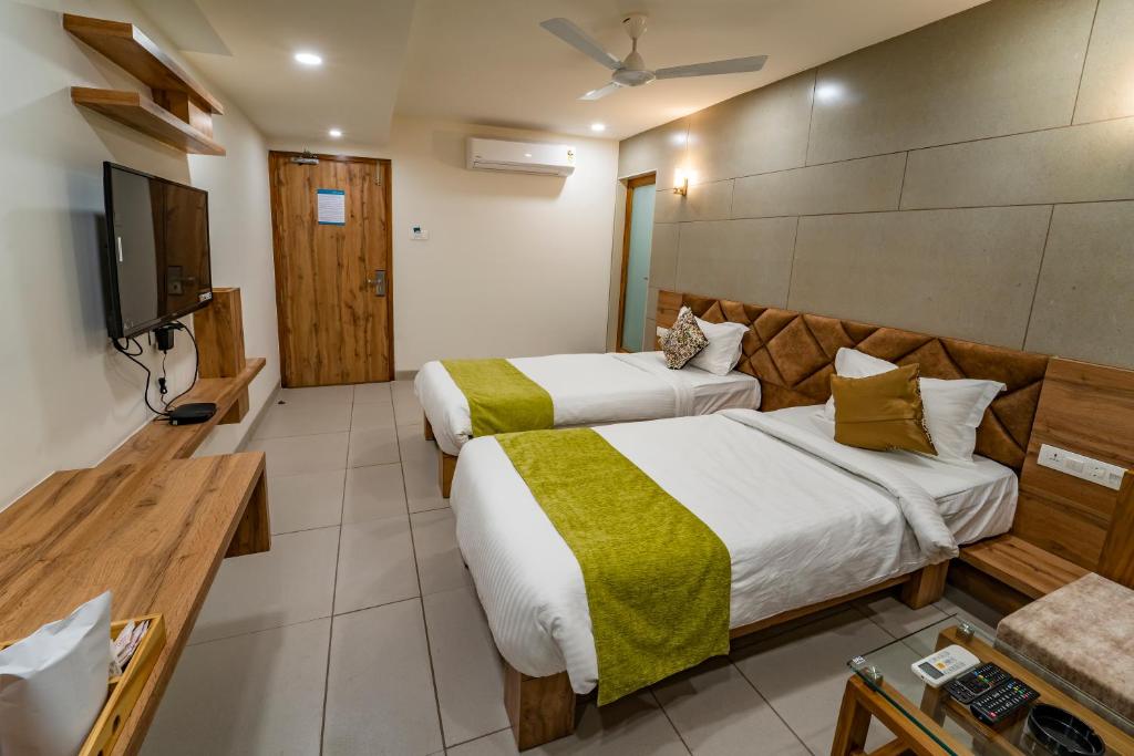 TV a/nebo společenská místnost v ubytování Hotel Pleasant Lake