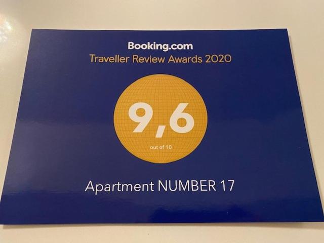 a blue card with a sign that says apartment number at Apartment NUMBER 17 in Vienna