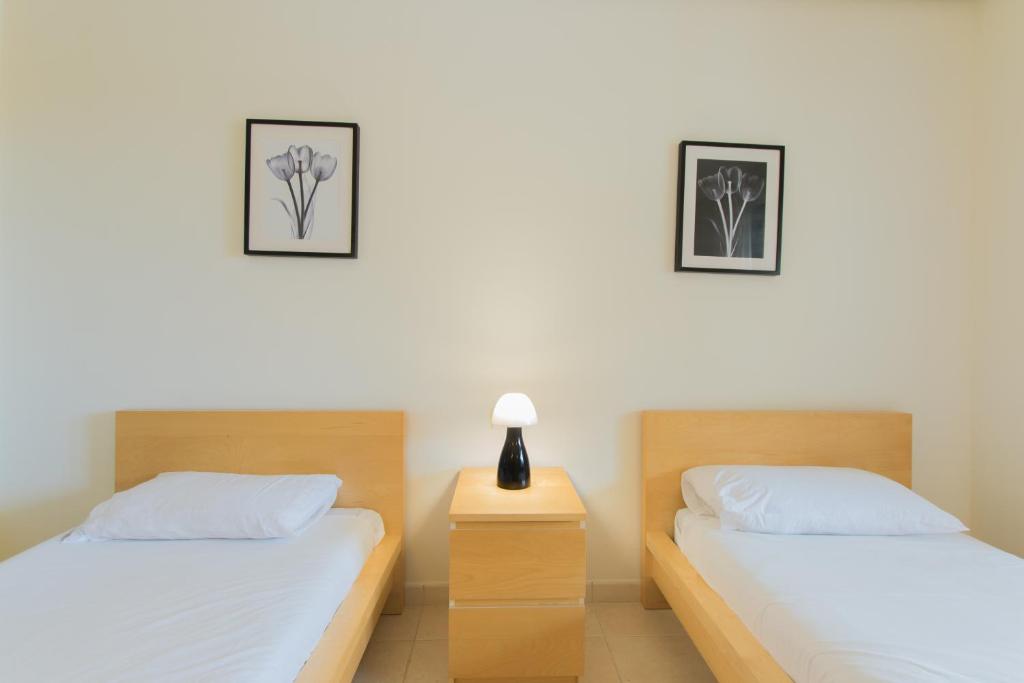 Postel nebo postele na pokoji v ubytování Balcon de Los Gigantes - TENESOL RENTALS
