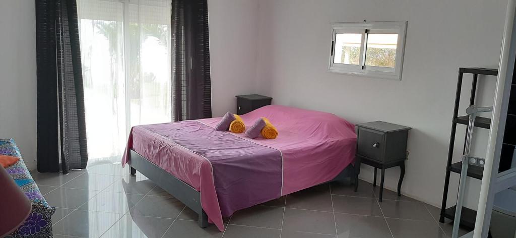 Postel nebo postele na pokoji v ubytování Villa CLIMATISEE avec piscine privée, ras el ma
