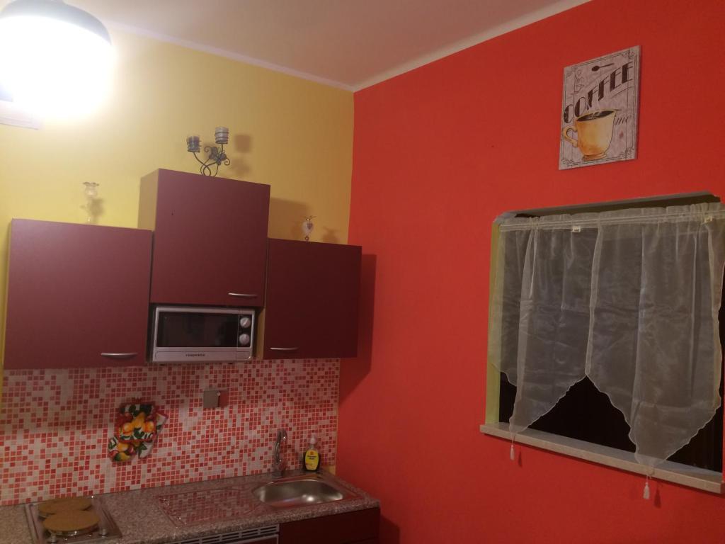 Kuchyňa alebo kuchynka v ubytovaní L'APPARTAMENTINO DIAMOND - Alloggio per uso turistico