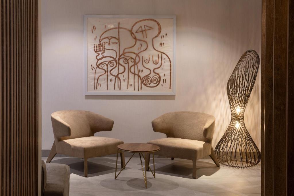 Posezení v ubytování The White Orchid Hotel