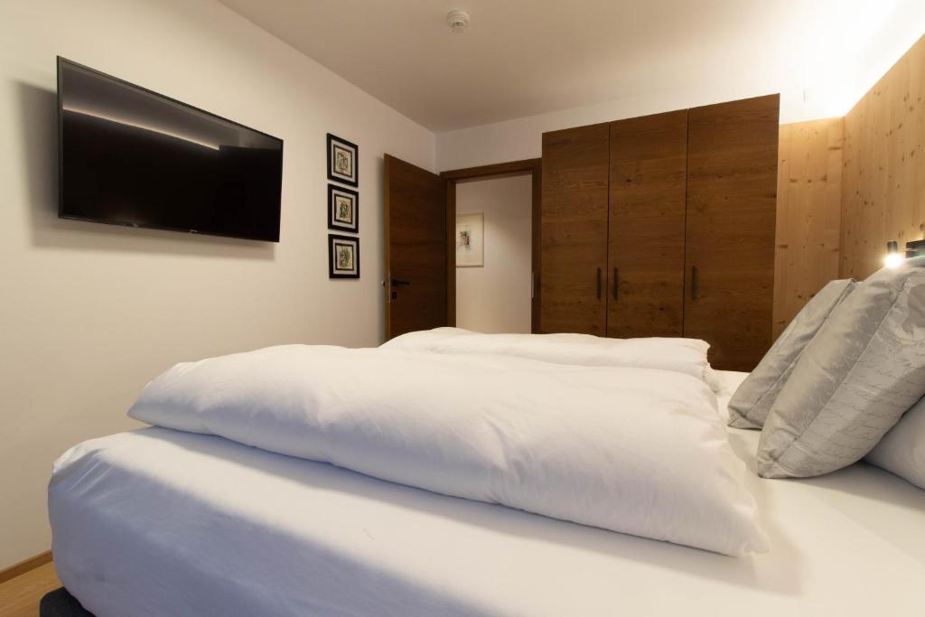 Ein Bett oder Betten in einem Zimmer der Unterkunft Wally Berg-Appartements
