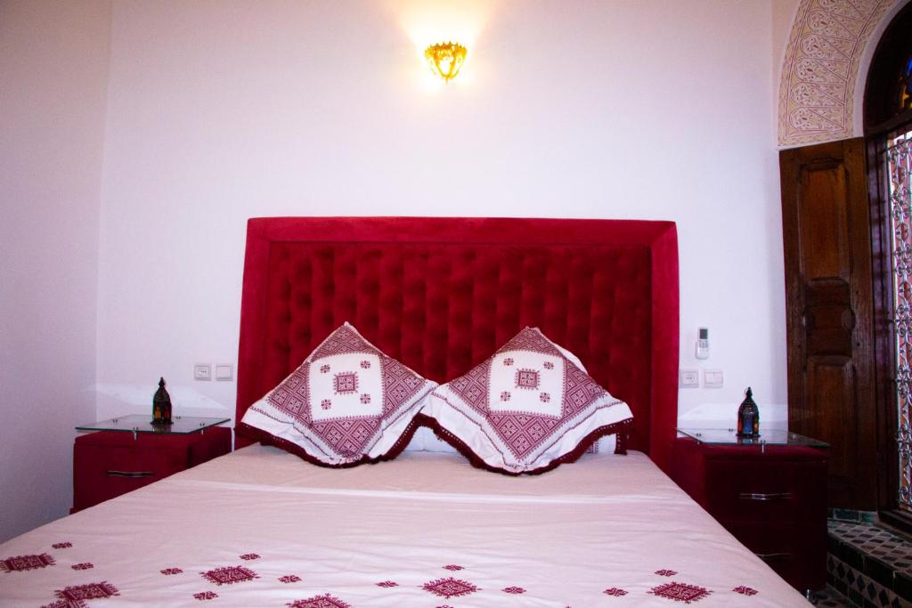 Postel nebo postele na pokoji v ubytování Riad Dar Senhaji