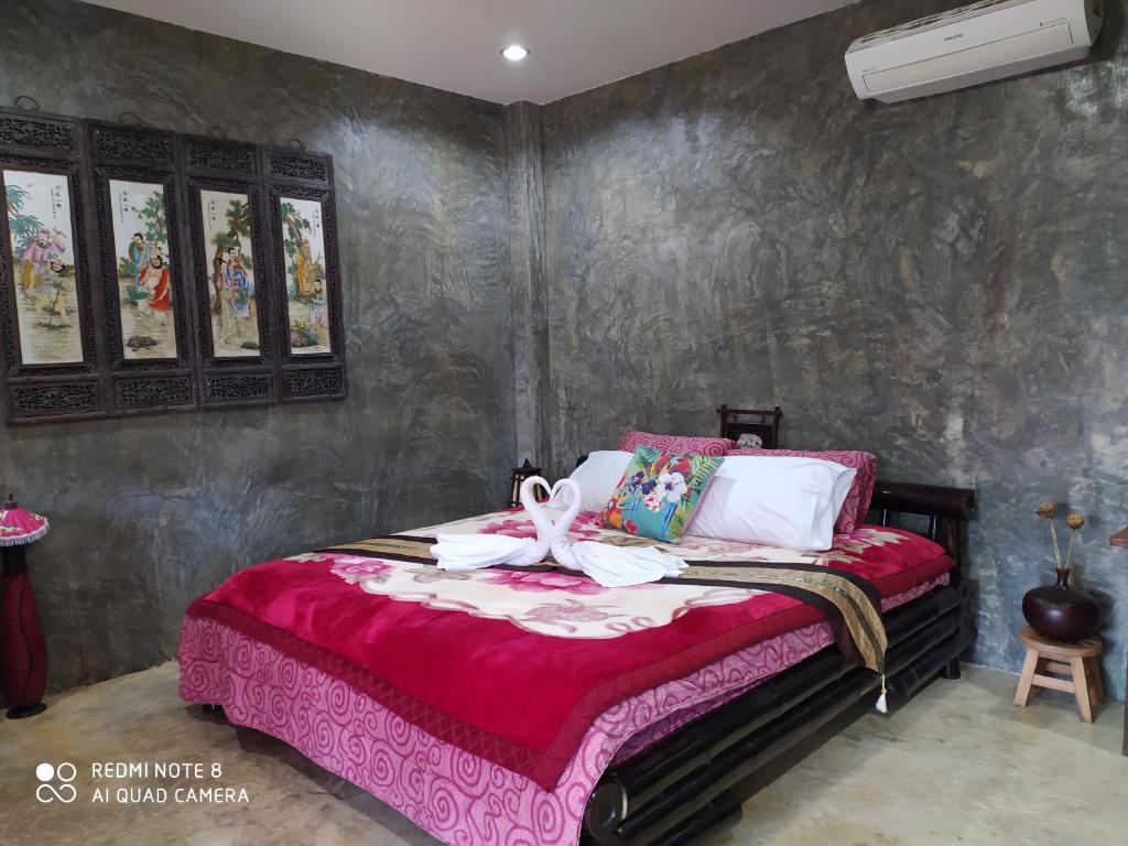 Postel nebo postele na pokoji v ubytování Angels Chambres d'hotes