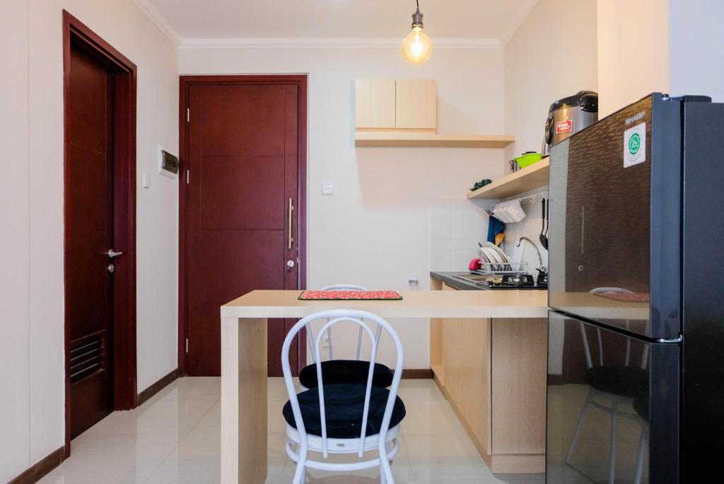 Warm and Relax 1BR at Asatti Garden House Apartment By Travelio - Apartamento De Un Dormitorio