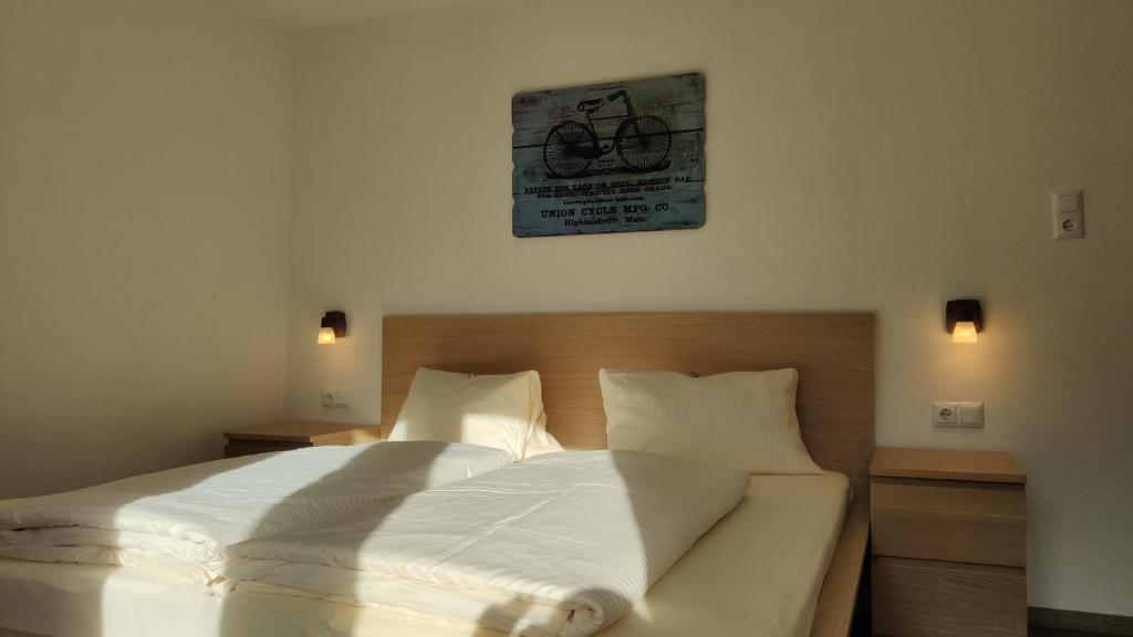 Postel nebo postele na pokoji v ubytování Gästehaus Maria
