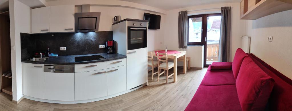 Kuchyň nebo kuchyňský kout v ubytování Gästehaus Maria