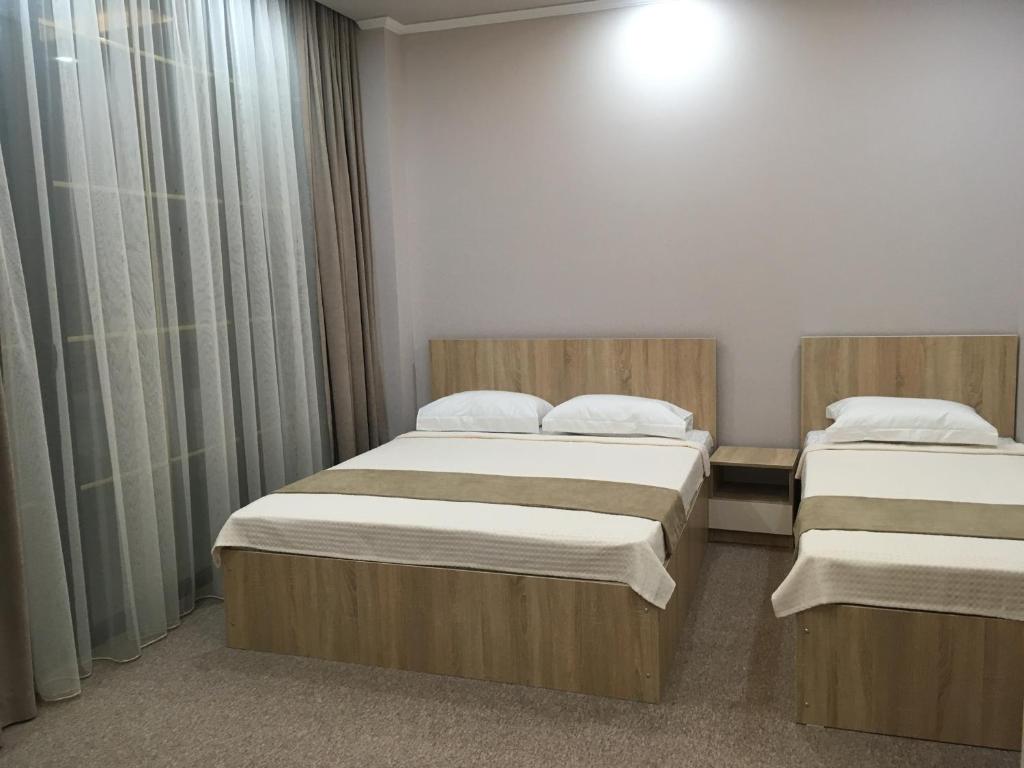 Postel nebo postele na pokoji v ubytování Riva