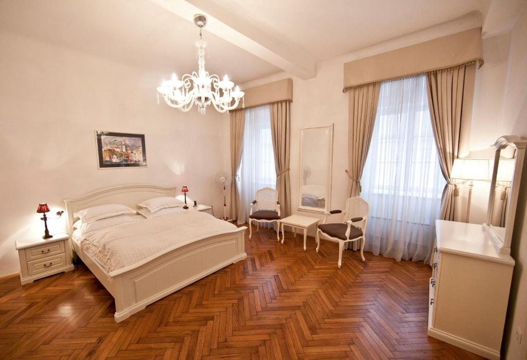 Postel nebo postele na pokoji v ubytování Antiq Palace - Historic Hotels of Europe