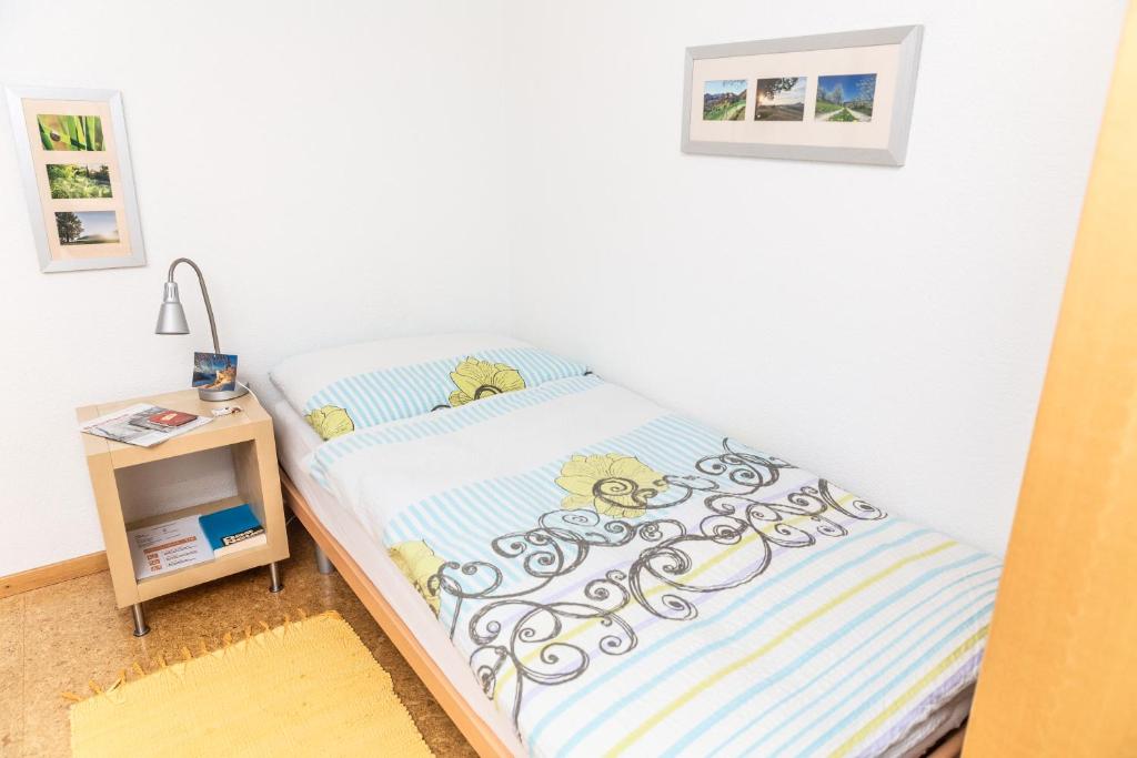 Postel nebo postele na pokoji v ubytování MyBednBreakfast in Bottmingen