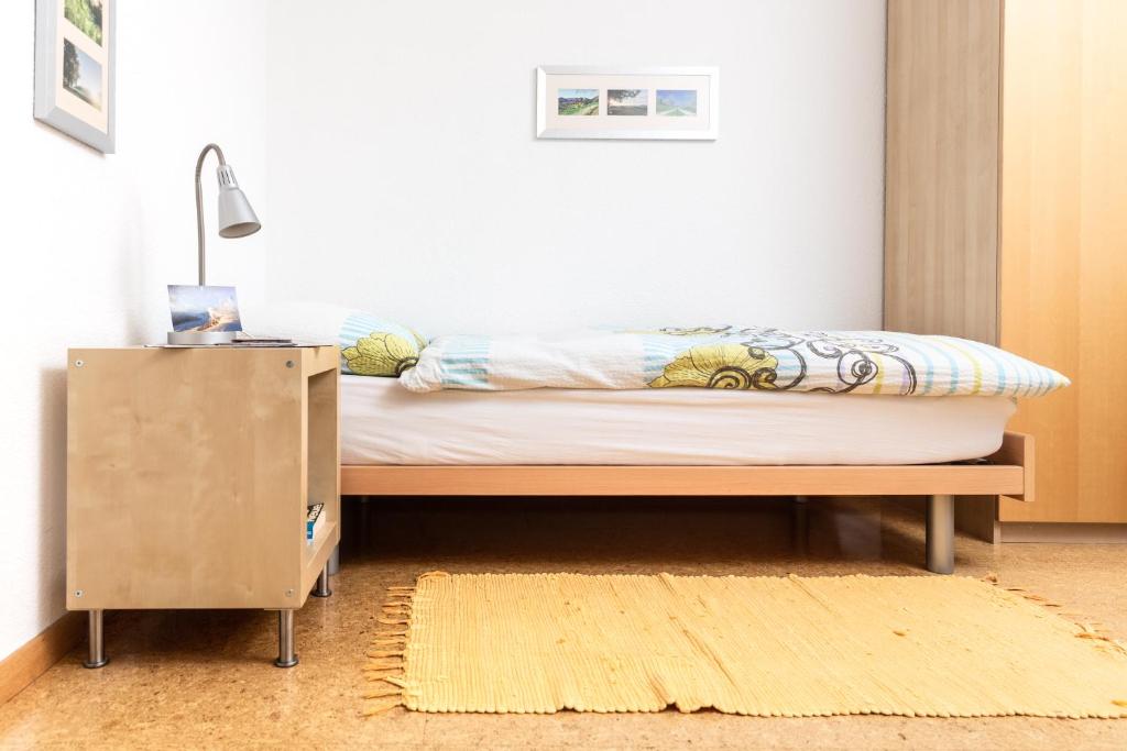 Postel nebo postele na pokoji v ubytování MyBednBreakfast in Bottmingen