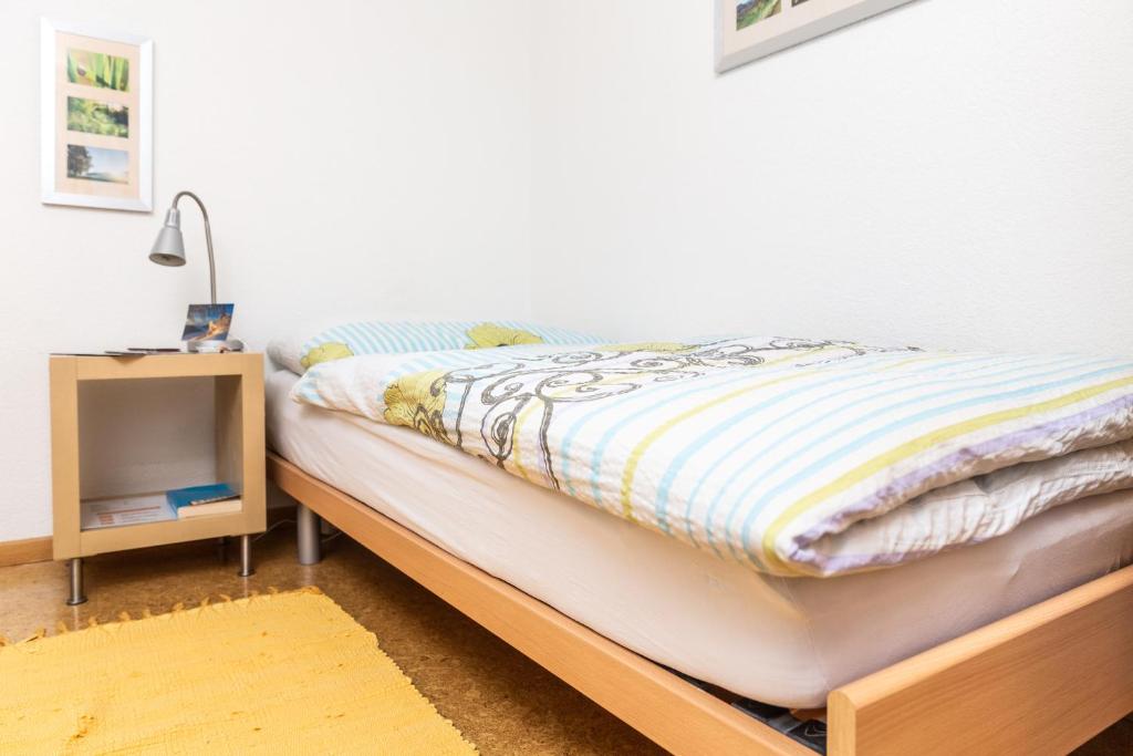 Postel nebo postele na pokoji v ubytování MyBednBreakfast in Bottmingen