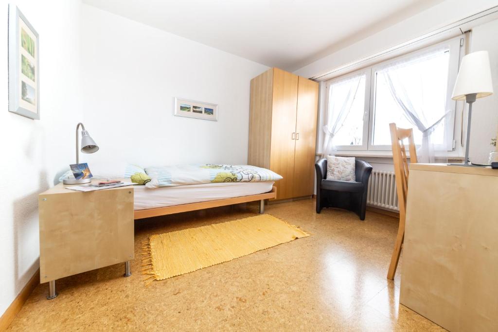 Postel nebo postele na pokoji v ubytování MyBednBreakfast in Bottmingen