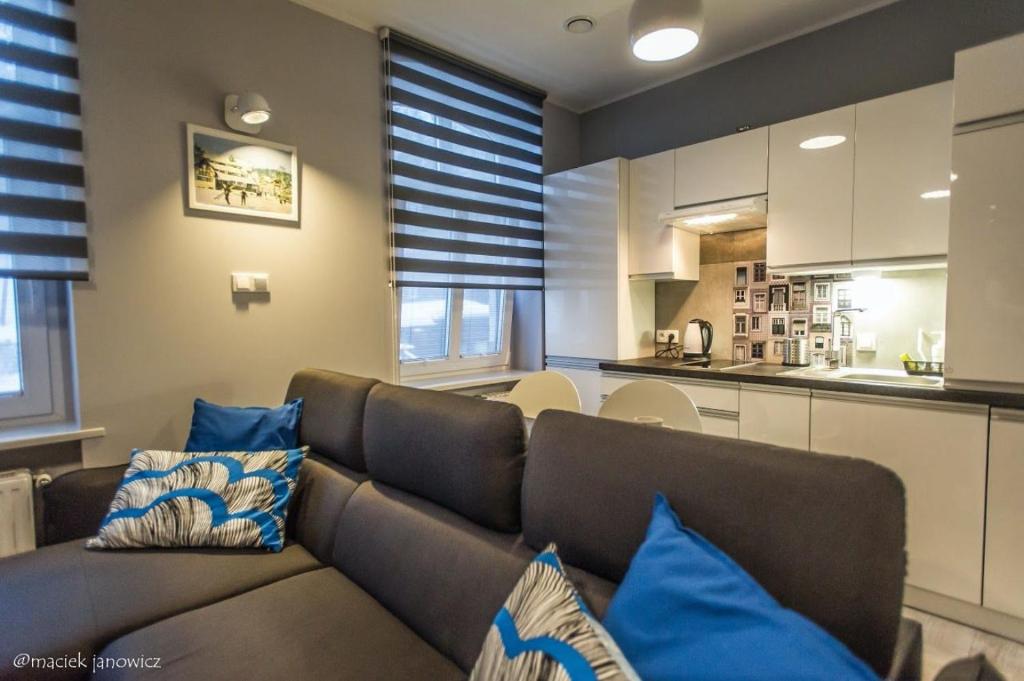 Kuchyňa alebo kuchynka v ubytovaní Apart-Invest Apartament Wiwi