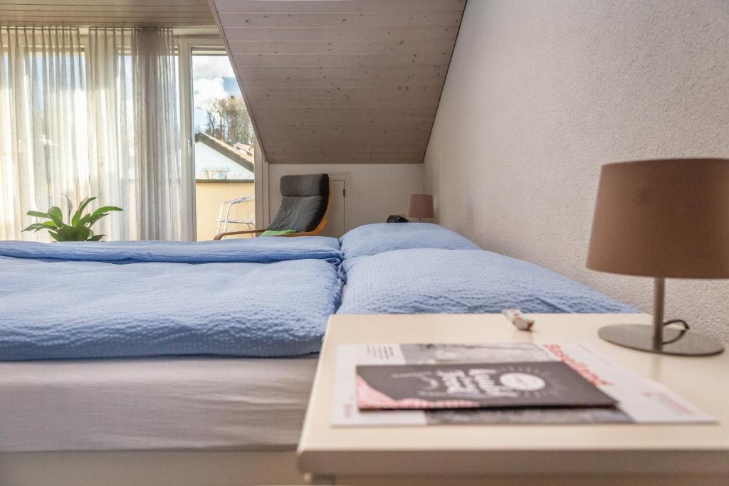 Postel nebo postele na pokoji v ubytování MyBednBreakfast in Bottmingen